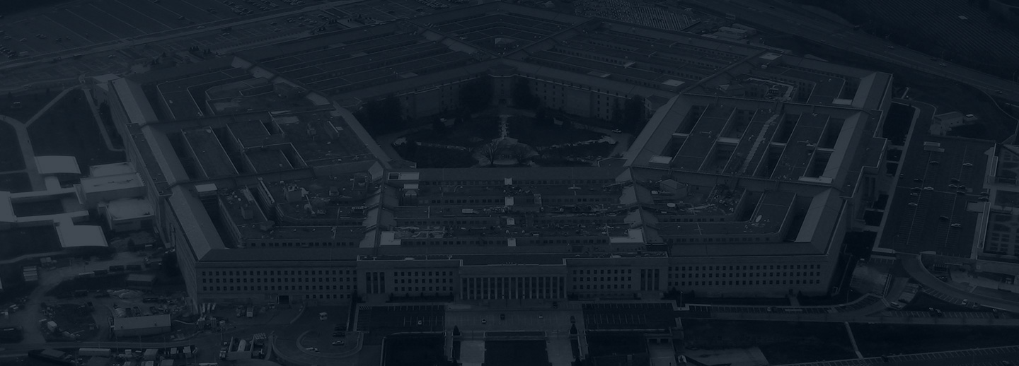 A dark, black and white aerial view of the Pentagon