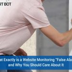 A man in a rose colored polo shirt leaning over with his hand on a fire alarm, about to depress the button.