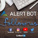 A tabletop with a coffee cup, grid paper, keyboard, pen, AlertBot logo, the word "follow us" formed from the cord of a mouse with the logos of facebook, instagram, youtube, twitter, and linkedin