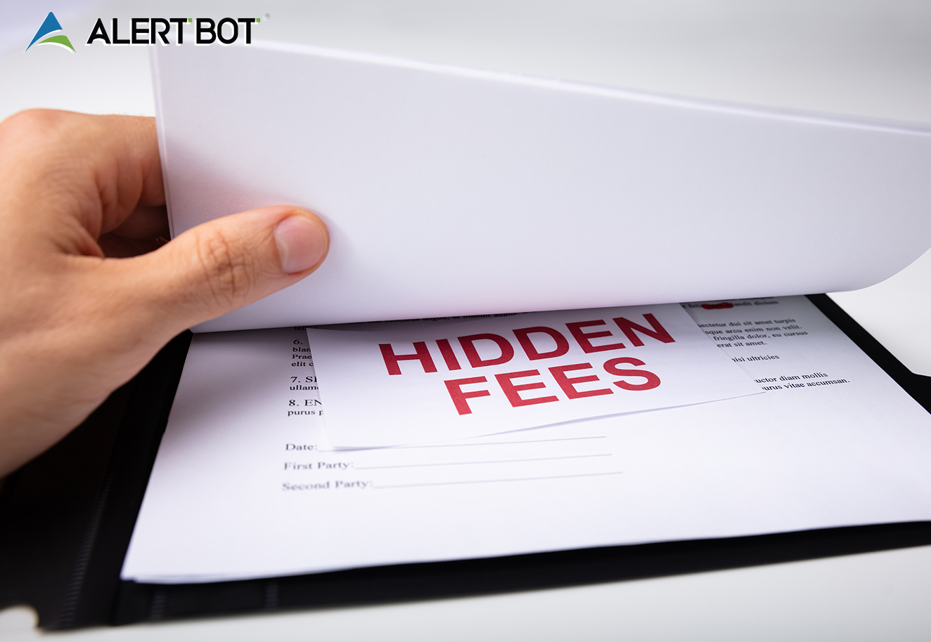 Blog title of "Warning: 3 Reasons Why You Shouldn&rsquo;t Pay a &ldquo;Setup Fee&rdquo; When Buying a Website Uptime Monitoring Solution" with photo of a man's hand lifting up a paper to reveal a small slip of paper between pages that reads "Hidden Fees."